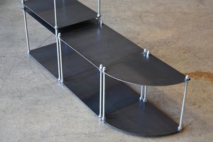 Three standard tables, one corner table, one set of vertical locks, oiled steel finish